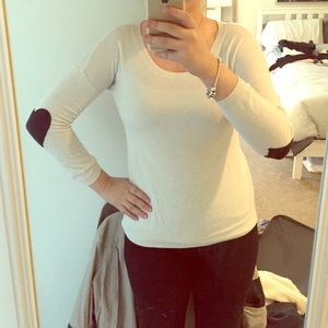 White sweater with heart elbow pads