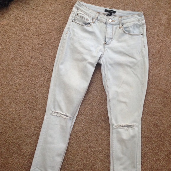 Light blue ripped at the knee jeans