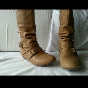 Medium height taupe colored boots