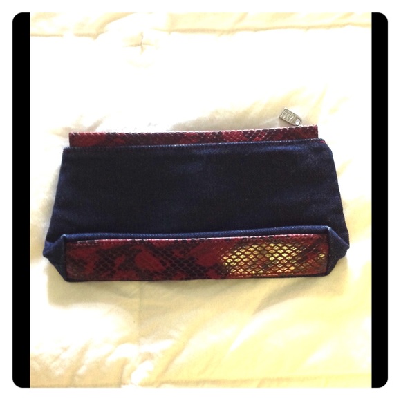 Saks Fifth Avenue Denim clutch with red details