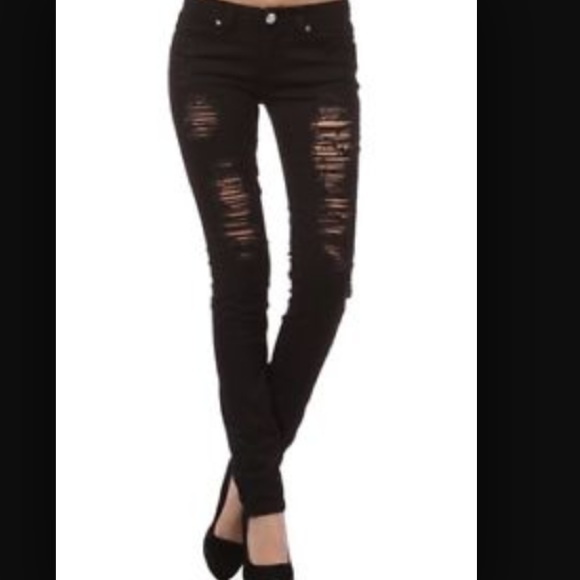 Black distressed skinny jeans