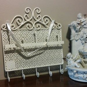 Creme colored metal jewelry holder