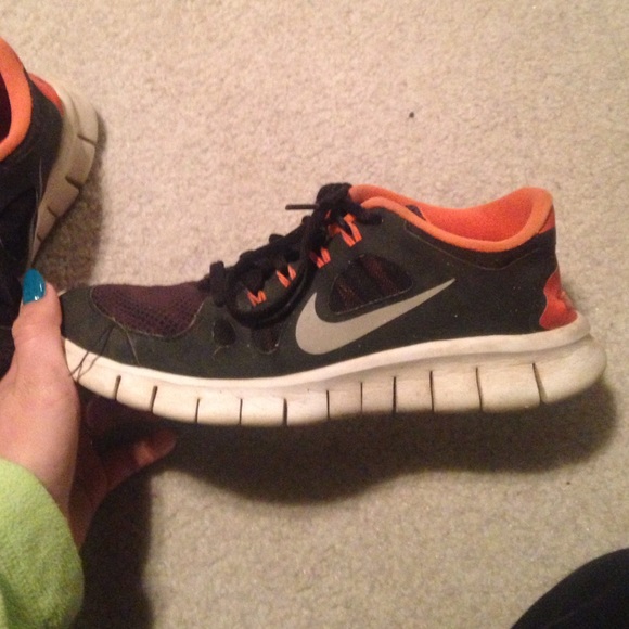 Black and orange Nike free 5.0