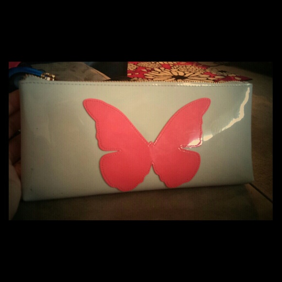 Beige clutch with pink butterfly