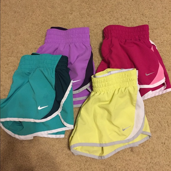 Four pairs of Nike Dri Fit Shorts