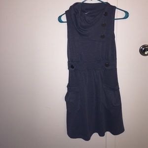 Sleeveless dress with gold buttons