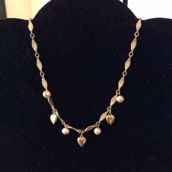 Gold colored heart and circle