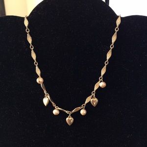 Gold colored heart and circle