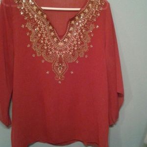 Flowing rust colored blouse
