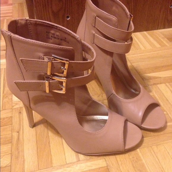 Tan high heeled shoes