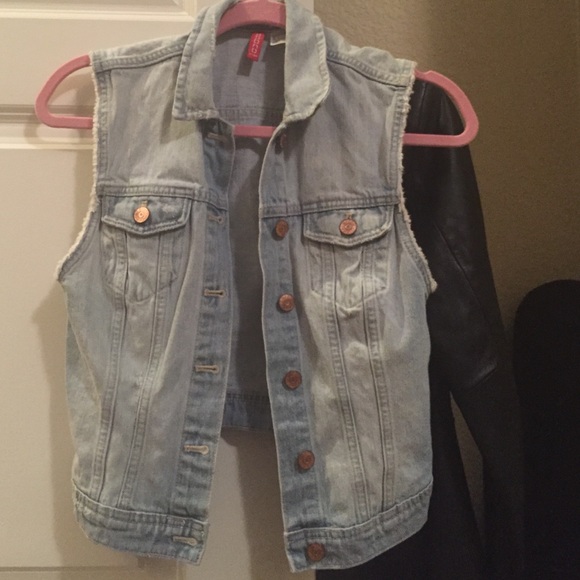 Distressed light wash denim vest