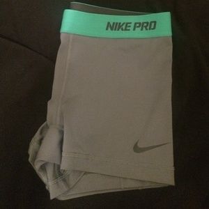 Grey and green spanks