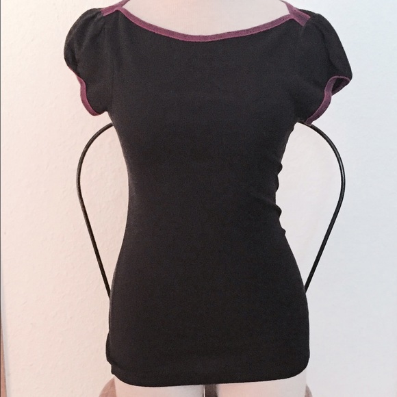 Back shirt with purple detail.