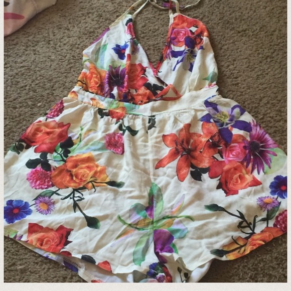 Brand new floral backless v neck romper!