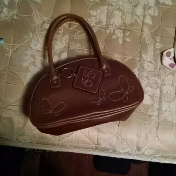 Brown leather arm bag