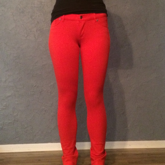 Bright red skinny jeans