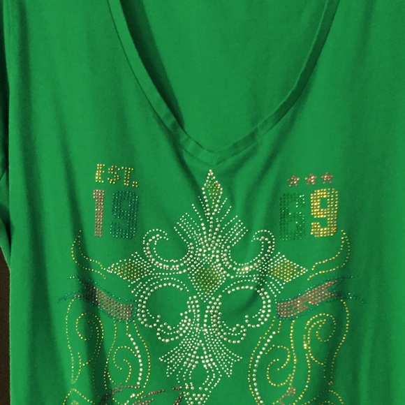 Green top short sleeve gathered in side