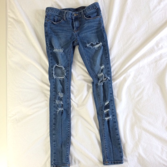 Skinny Medium wash blue jeans with rips