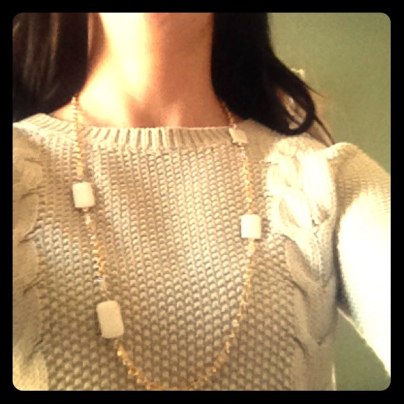 Long white and gold necklace