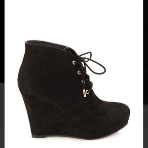 Black wedge booties