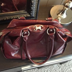 Michael Kors Purse it is about 14 " wide 9" tall