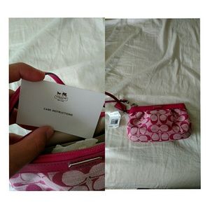 ON HOLD. coach wristlet.