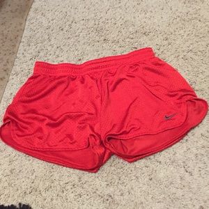 Red nike shorts