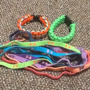 7 different under amour headbands and 2 braclets