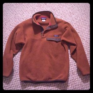 Dark orange Patagonia fleece pullover
