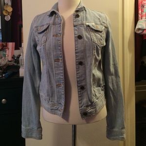 Distressed light wash denim jacket