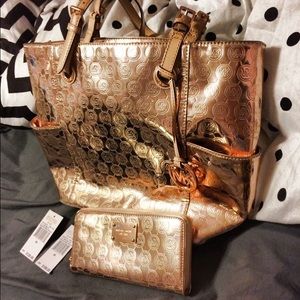 Rose gold michael Kors handbag and matching Wallet