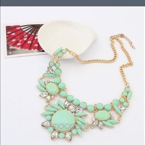 Mint green and gold fashion necklace.