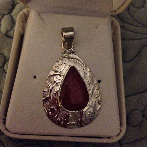 Sterling silver natural ruby pendant.