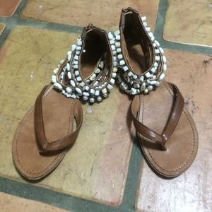 Light brown sandals with beaded ankles