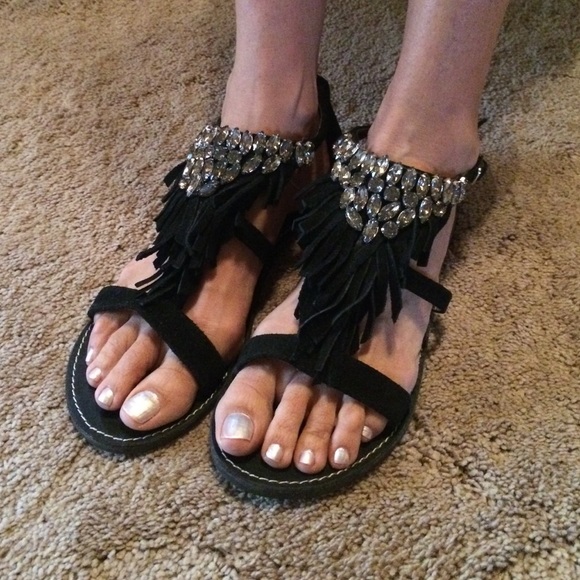 Black embellished fringe saddles