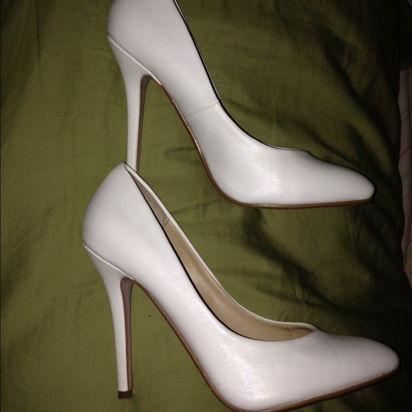 White pointy toed high heels