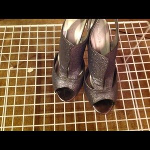 High heal open toes sparkling silver shoe.