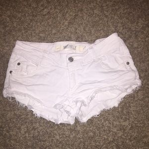 Brandy Melville distressed white denim shorts