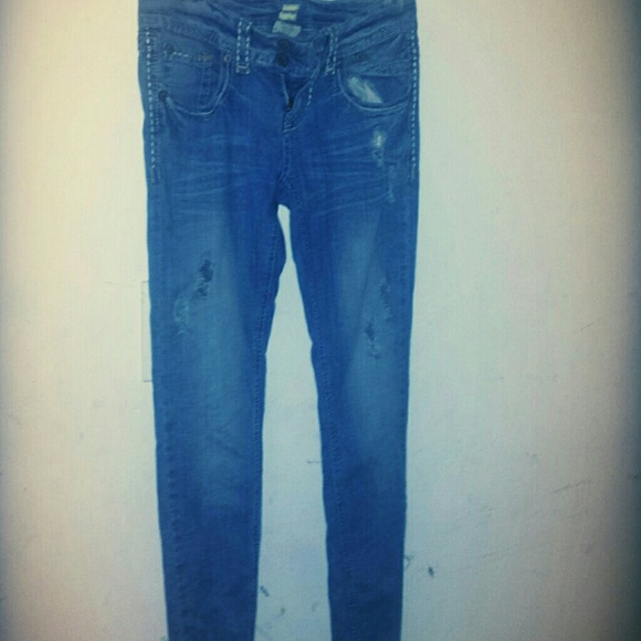 Blue ripped skinny jeans