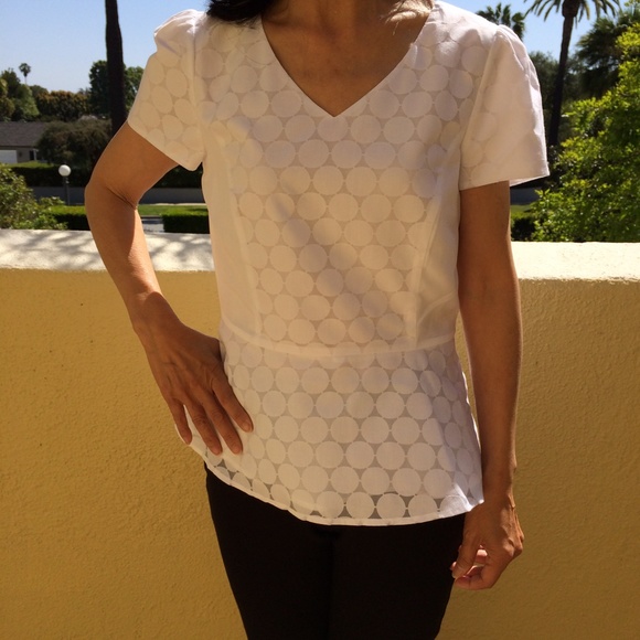 Brand new white polka dot peplum shirt. No trades