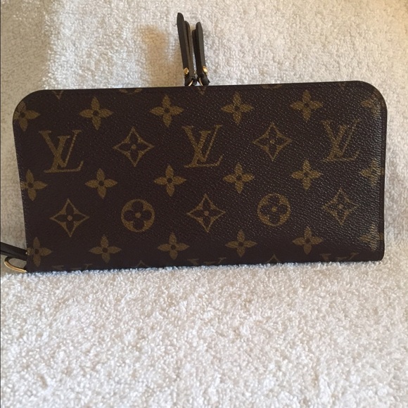 SOLD!!!....Louis Vuitton Insolite Wallet