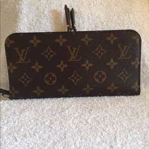 SOLD!!!....Louis Vuitton Insolite Wallet