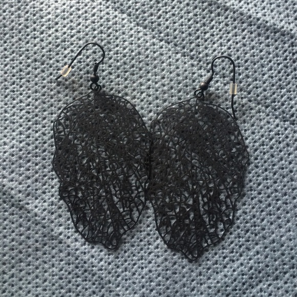 Black dangly artistic earrings