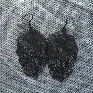 Black dangly artistic earrings