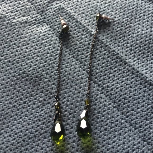 Green dangly earrings with green gem