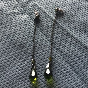 Green dangly earrings with green gem