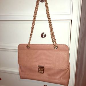 Salmon colored handbag