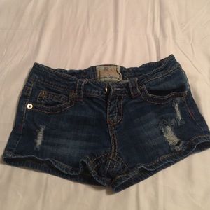 Short distressed jean shorts
