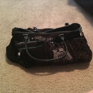 A juicy couture diaper bag. In great condition.