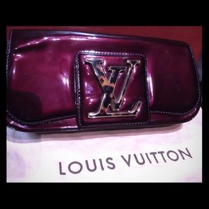 Louis Vuitton burgundy Sobe Clutch